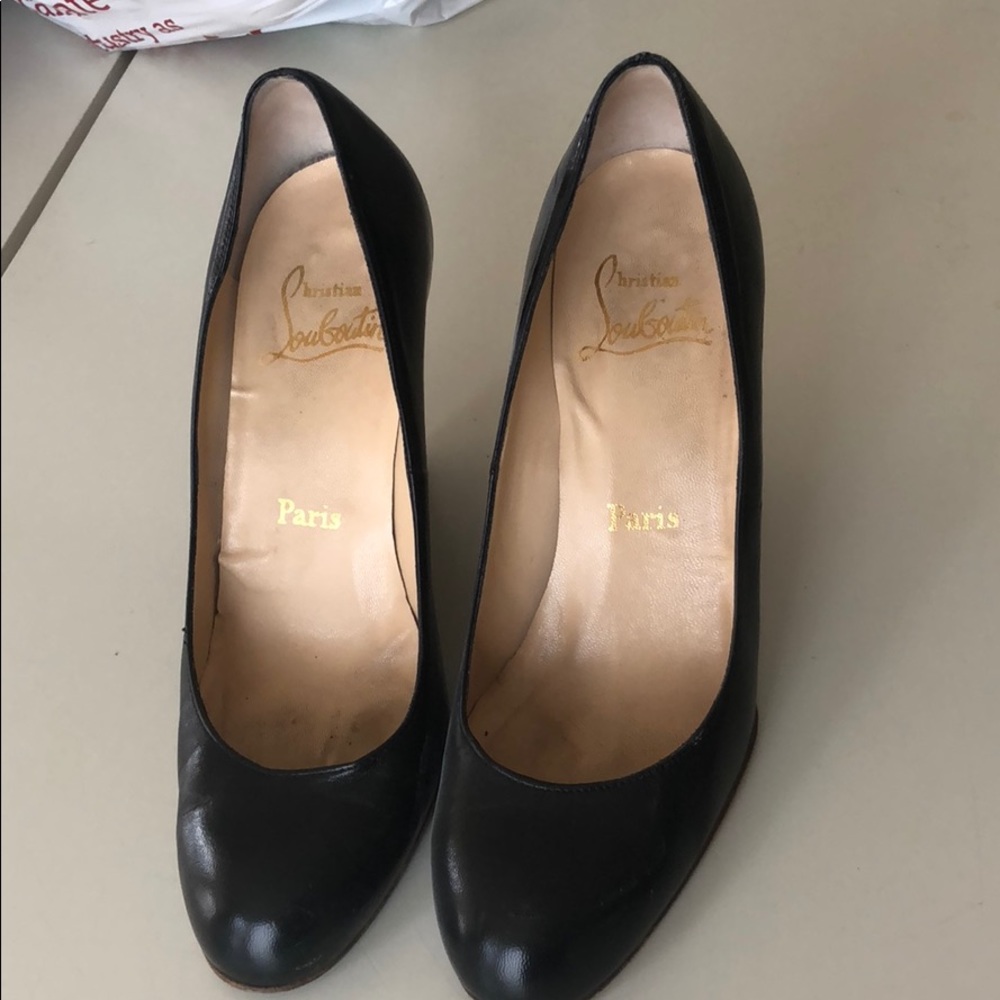 Christian Louboutin black leather wedges